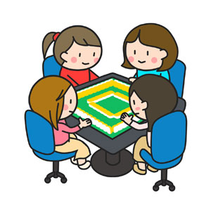 マージャン卓を囲む女性